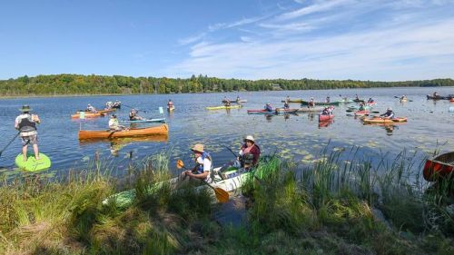 Friends of Lanark Highlands organised a paddle party at Barbers Lake on September 16 to protest the proposed mining of sand from the lake bottom and surrounding area by Cavanaugh Construction.
